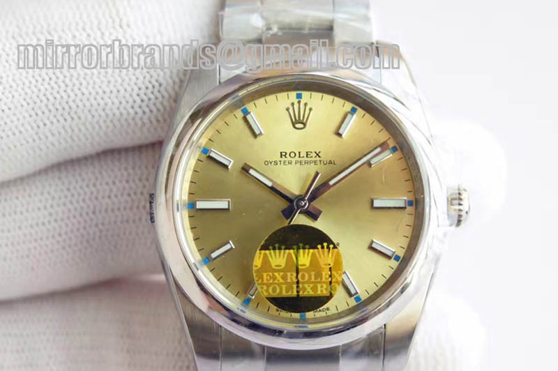 Rolex Osyter Perpetual 114300 SS/SS Champagne Gold A-2836