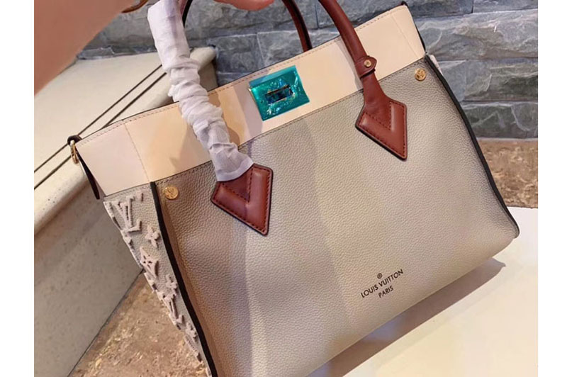 Louis Vuitton M53825 LV On My Side Twist calfskin and Monogram tufting on Grey Nappa Softy leather