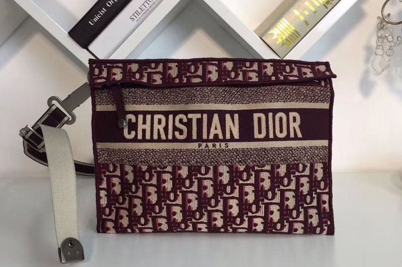 Dior M1292 Clutch bag in burgundy Dior Oblique embroidered canvas
