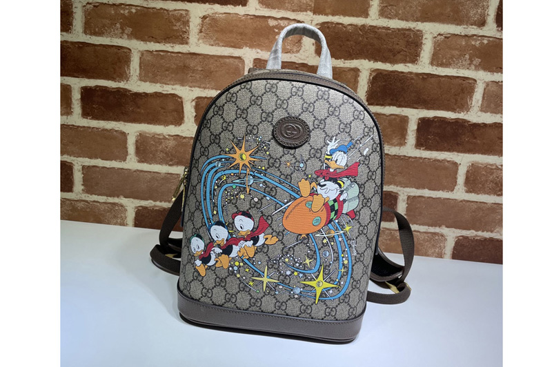 Gucci 552884 Disney x Gucci Donald Duck small backpack in Beige and ebony GG Supreme canvas