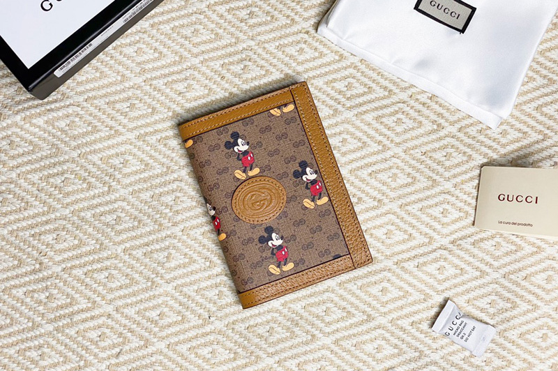 Gucci 602538 Disney x Gucci passport case in Beige/ebony mini GG Supreme canvas