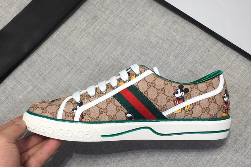 Mens and Womens Gucci 606111 Disney x Gucci Tennis 1977 sneaker with Web in Beige GG Supreme