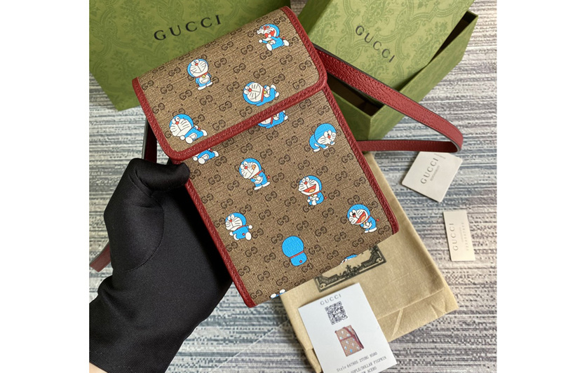 Gucci 647927 Gucci Donald Duck mini bag in Beige/ebony mini GG Supreme and Doraemon Print