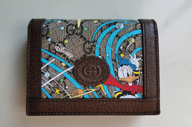 Gucci 648121 Disney x Gucci Donald Duck card case wallet in Beige and ebony GG Supreme canvas