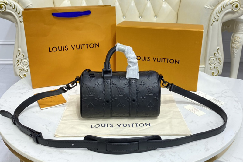 Louis Vuitton M57960 LV Keepall XS bag in Black Monogram Seal cowhide leather