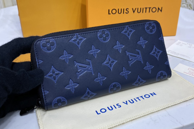 Louis Vuitton M80423 LV Zippy Vertical Wallet in navy blue Monogram Shadow leather