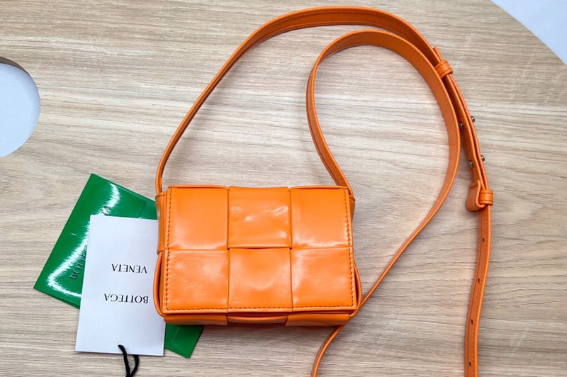 Bottega Veneta 667048 Cassette mini bag in Orange Intreccio leather