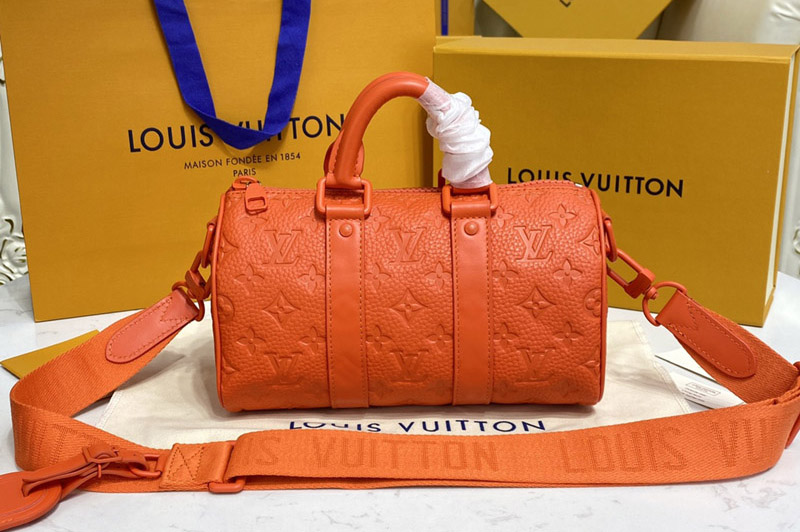Louis Vuitton M20930 LV Keepall Bandouliere 25 bag in Orange Taurillon Monogram leather