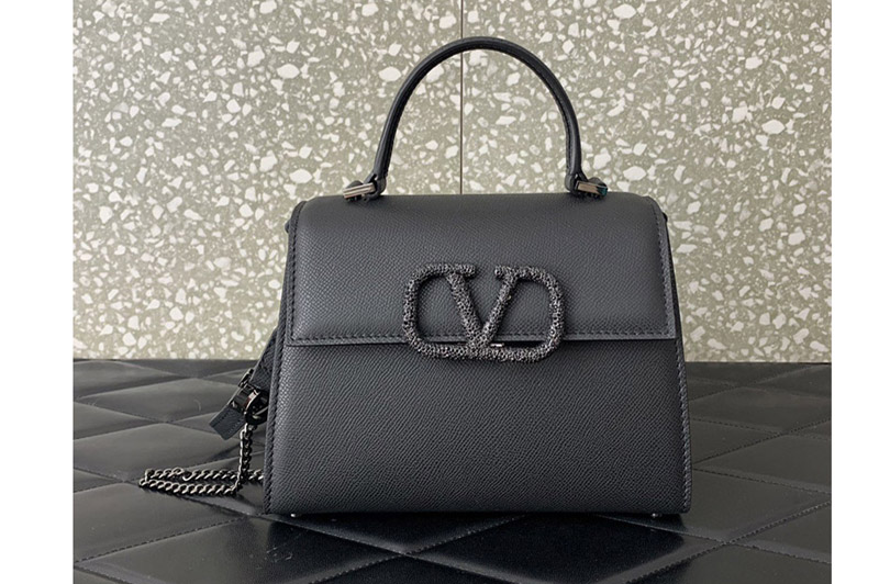 Valentino Garavani VSLING small handbag in Black grainy calfskin and VLogo